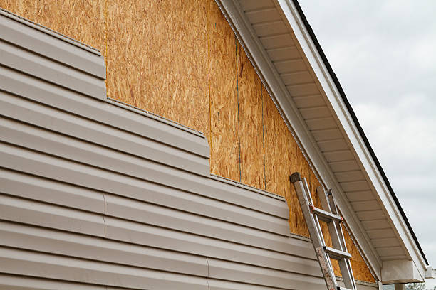 Professional Siding Repair technician working in Bedford, MA